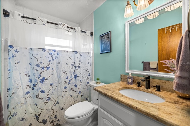705 Washington Ave, Eustis, FL 32726 - bathroom with vanity, toilet, and a shower with shower curtain