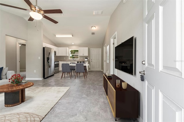20443 SW Rainbow Lakes Blvd, Dunnellon, FL 34431 - living area with a ceiling fan, baseboards, and high vaulted ceiling