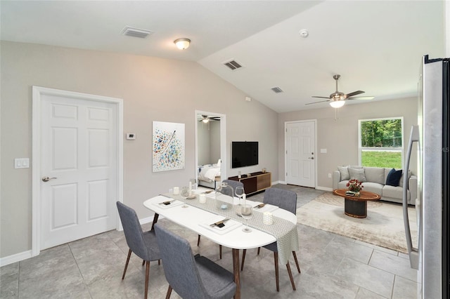 20443 SW Rainbow Lakes Blvd, Dunnellon, FL 34431 - dining room featuring a ceiling fan, lofted ceiling, baseboards, and light tile patterned flooring