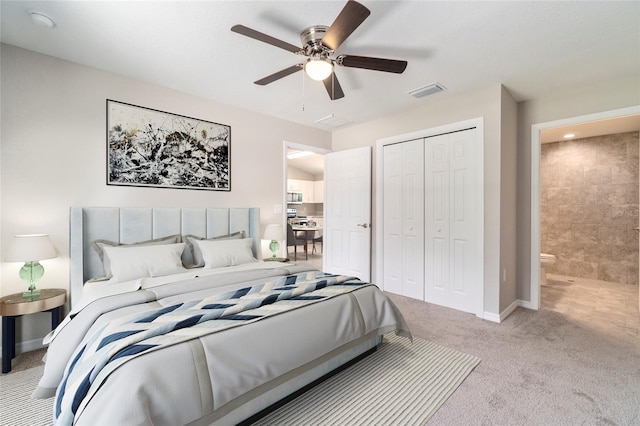 20443 SW Rainbow Lakes Blvd, Dunnellon, FL 34431 - carpeted bedroom with a closet, baseboards, and ceiling fan