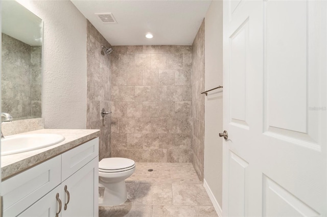 20443 SW Rainbow Lakes Blvd, Dunnellon, FL 34431 - full bath with vanity, toilet, and tiled shower