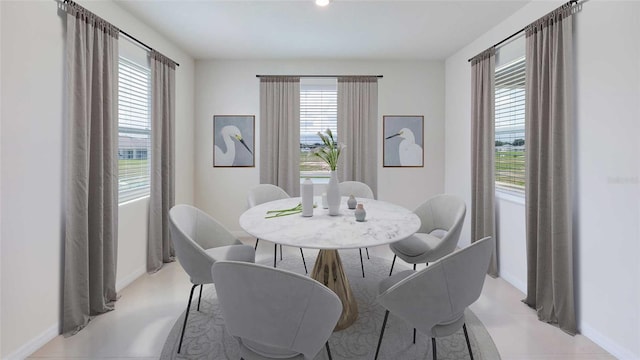 12809 NW 13th Ln, Newberry, FL 32669 - dining space featuring healthy amount of natural light and baseboards