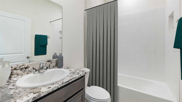 12809 NW 13th Ln, Newberry, FL 32669 - full bathroom featuring vanity, toilet, and shower / bathtub combination with curtain