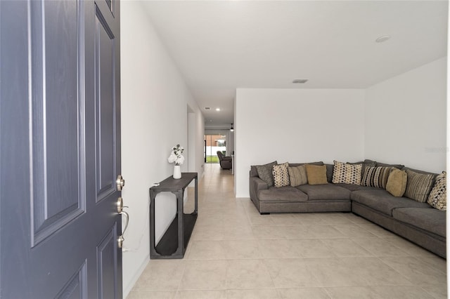 7224 SW 61st Pl, Ocala, FL 34474 - living area with light tile patterned floors, recessed lighting, and baseboards