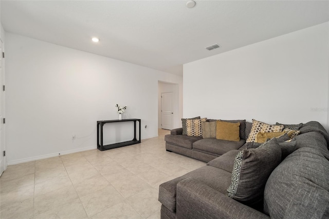 7224 SW 61st Pl, Ocala, FL 34474 - living room featuring light tile patterned flooring and baseboards
