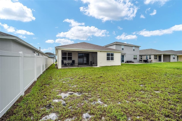 7224 SW 61st Pl, Ocala, FL 34474 - rear view of house with a sunroom, stucco siding, and a patio area
