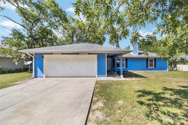 11 SE Fir Trail Trak, Ocala, FL 34472 - ranch-style home with an attached garage, driveway, and a front lawn