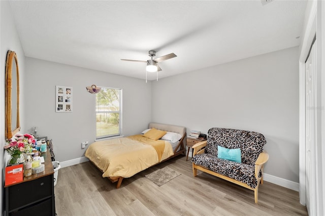 11 SE Fir Trail Trak, Ocala, FL 34472 - bedroom featuring light wood finished floors, baseboards, a ceiling fan, and a closet