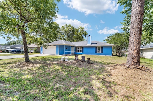 11 SE Fir Trail Trak, Ocala, FL 34472 - ranch-style house featuring an attached garage, concrete driveway, a front lawn, and a chimney