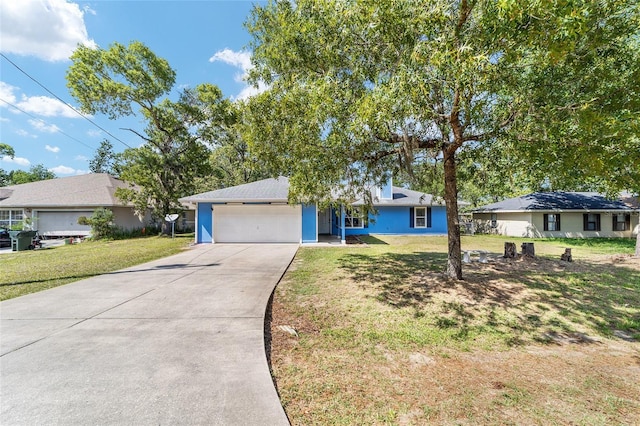 11 SE Fir Trail Trak, Ocala, FL 34472 - view of front of property with a garage, driveway, and a front yard
