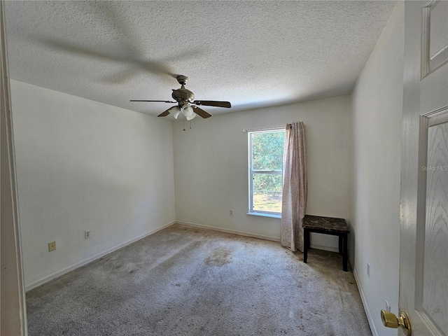 18 Fir Trail Dr, Ocala, FL 34472 - carpeted empty room with a ceiling fan, a textured ceiling, and baseboards