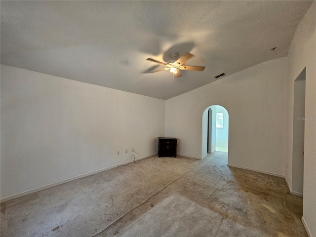 18 Fir Trail Dr, Ocala, FL 34472 - empty room with ceiling fan, light colored carpet, arched walkways, and baseboards