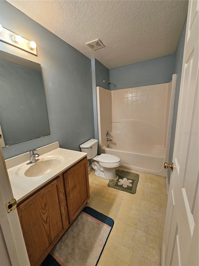 18 Fir Trail Dr, Ocala, FL 34472 - full bath featuring tile patterned floors, toilet, vanity, bathing tub / shower combination, and a textured ceiling