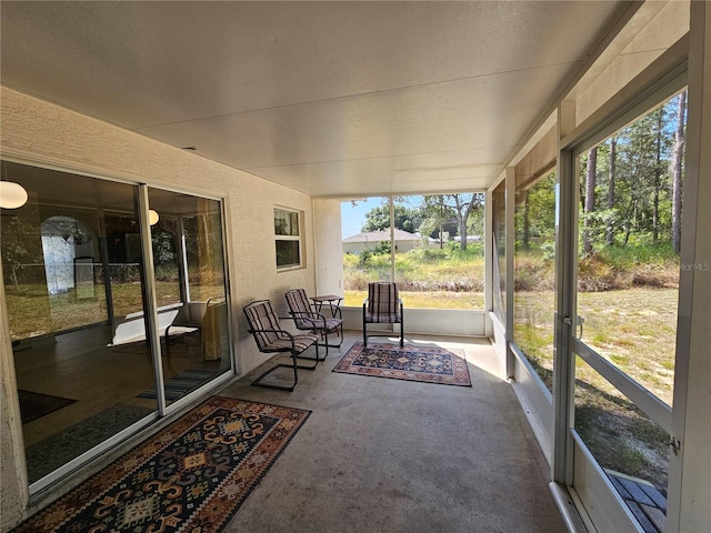 18 Fir Trail Dr, Ocala, FL 34472 - sunroom / solarium with plenty of natural light and a fire pit