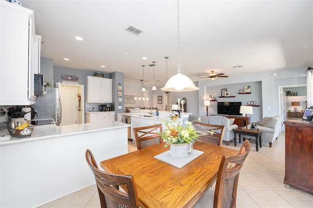 7333 SW 98th Ct, Ocala, FL 34481 - dining area featuring a ceiling fan, light tile patterned floors, and recessed lighting