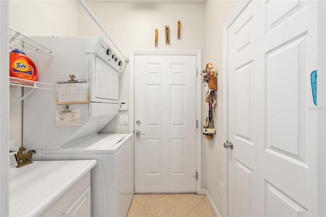 7333 SW 98th Ct, Ocala, FL 34481 - laundry room with light tile patterned floors and stacked washing machine and dryer