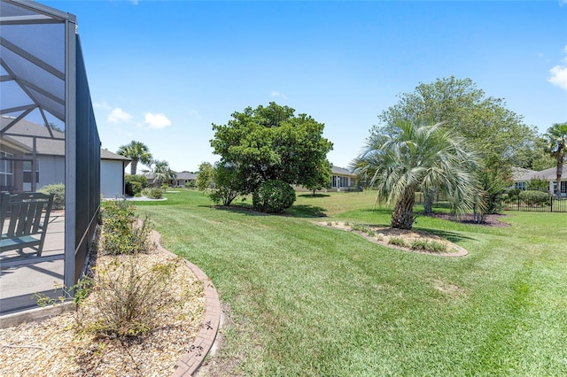 7333 SW 98th Ct, Ocala, FL 34481 - view of green lawn with a lanai