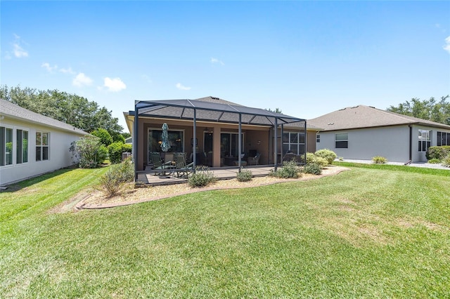 7333 SW 98th Ct, Ocala, FL 34481 - back of property featuring a patio area, a lawn, glass enclosure, and stucco siding