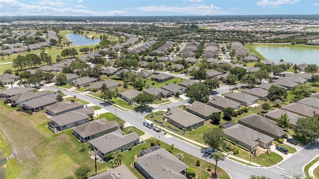 7333 SW 98th Ct, Ocala, FL 34481 - aerial view of property and surrounding area with a large body of water and nearby suburban area