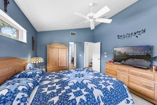 2434 Walnut Heights Rd, Apopka, FL 32703 - bedroom featuring vaulted ceiling and a ceiling fan