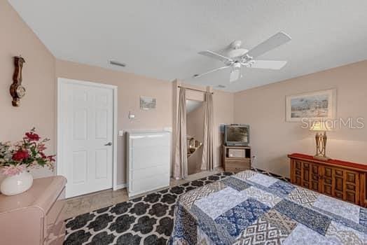 2434 Walnut Heights Rd, Apopka, FL 32703 - bedroom featuring a ceiling fan