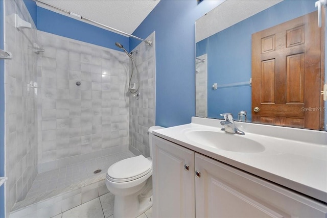 4331 SE 106th Pl, Belleview, FL 34420 - full bath with tiled shower, vanity, a textured ceiling, tile patterned flooring, and toilet