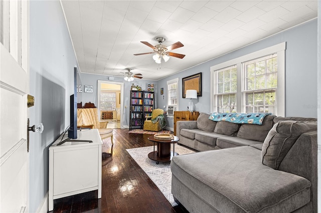 1405 NE 55th St, Ocala, FL 34479 - living room with healthy amount of natural light, dark wood-style flooring, and a ceiling fan