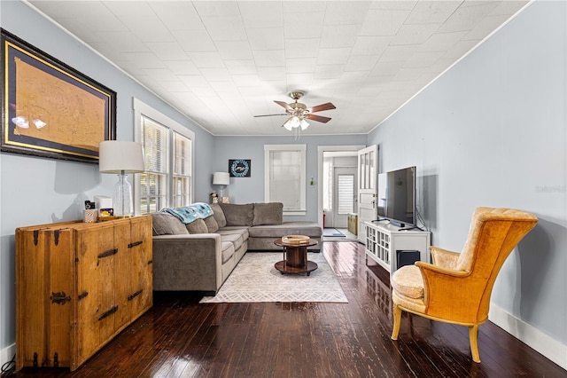 1405 NE 55th St, Ocala, FL 34479 - living room with hardwood / wood-style floors, a ceiling fan, crown molding, and baseboards