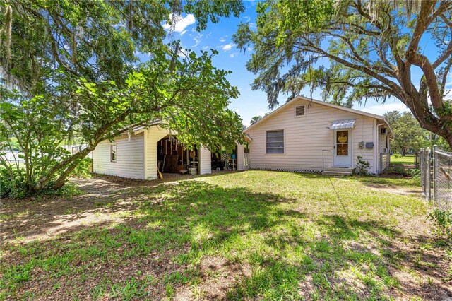 1405 NE 55th St, Ocala, FL 34479 - back of property with a gate