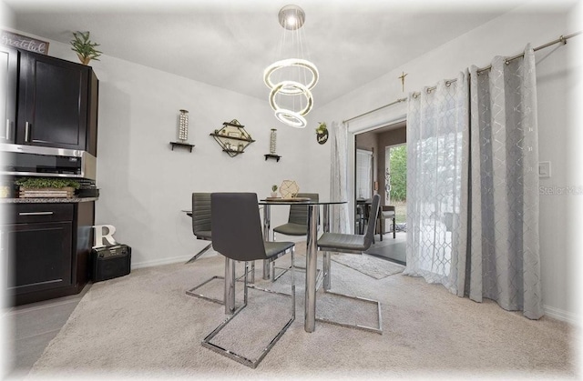 96 Hickory Crse, Ocala, FL 34472 - dining space with light colored carpet and a chandelier