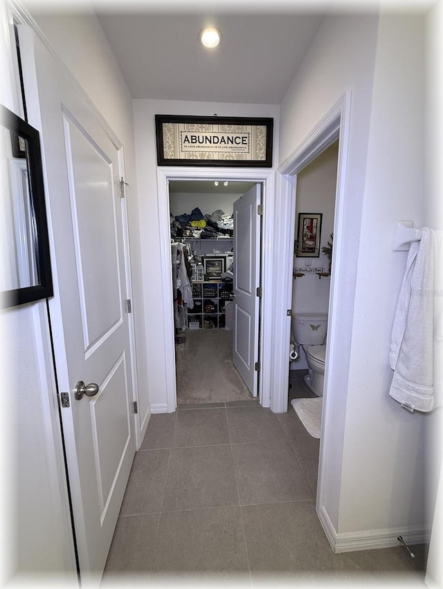96 Hickory Crse, Ocala, FL 34472 - hall featuring dark tile patterned flooring and recessed lighting