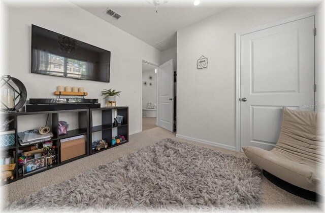 96 Hickory Crse, Ocala, FL 34472 - sitting room with carpet flooring and lofted ceiling