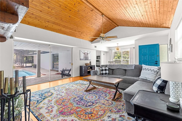 2475 SW 7th Ave, Ocala, FL 34471 - living room with vaulted ceiling, wood ceiling, a ceiling fan, and wood finished floors