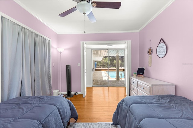 2475 SW 7th Ave, Ocala, FL 34471 - bedroom with light wood-style flooring, crown molding, a ceiling fan, and baseboards