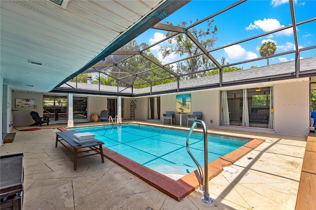 2475 SW 7th Ave, Ocala, FL 34471 - swimming pool featuring a patio and glass enclosure
