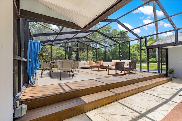 2475 SW 7th Ave, Ocala, FL 34471 - view of patio featuring outdoor lounge area, a wooden deck, outdoor dining space, and glass enclosure
