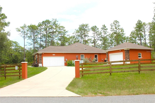 5306 W Comstock Pl, Beverly Hills, FL 34465 - ranch-style house featuring a garage, concrete driveway, and stucco siding