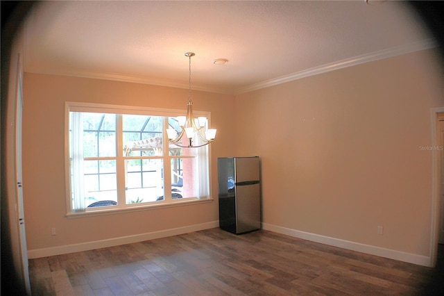5306 W Comstock Pl, Beverly Hills, FL 34465 - unfurnished dining area featuring a chandelier, crown molding, dark wood-type flooring, and baseboards