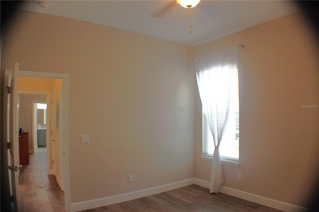 5306 W Comstock Pl, Beverly Hills, FL 34465 - spare room featuring a ceiling fan, light wood-style floors, and baseboards