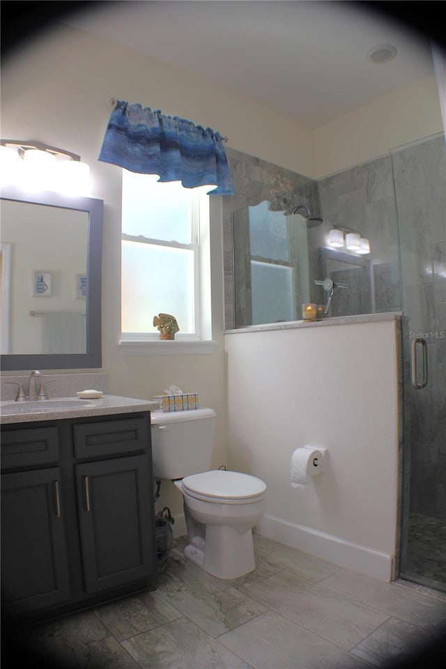 5306 W Comstock Pl, Beverly Hills, FL 34465 - bathroom featuring toilet, vanity, and a shower stall
