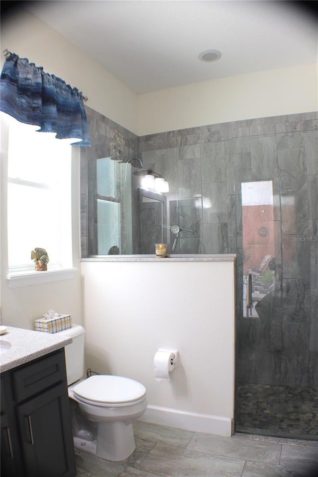 5306 W Comstock Pl, Beverly Hills, FL 34465 - full bath with vanity, tiled shower, toilet, and wood finished floors