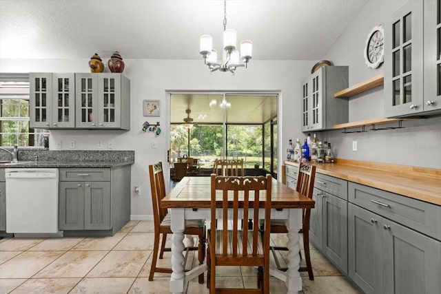 14131 SE 86th Ter, Inglis, FL 34449 - dining area featuring plenty of natural light and a chandelier