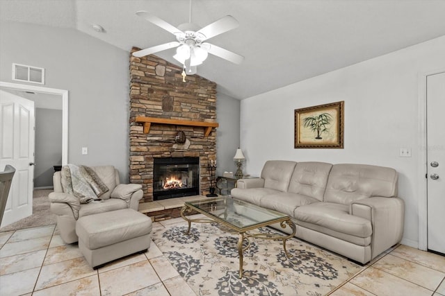14131 SE 86th Ter, Inglis, FL 34449 - living room with vaulted ceiling, ceiling fan, and a fireplace