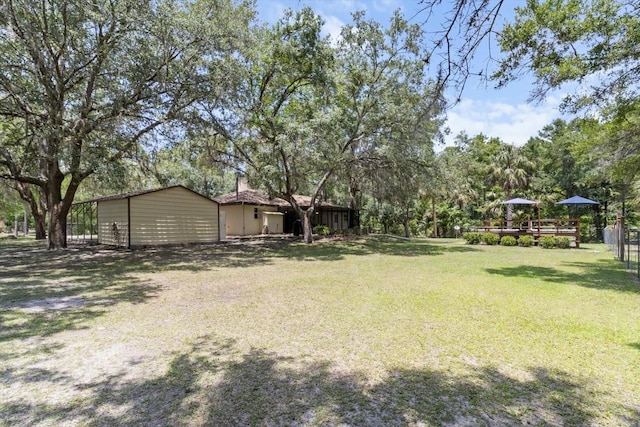 14131 SE 86th Ter, Inglis, FL 34449 - view of grassy yard featuring view of scattered trees