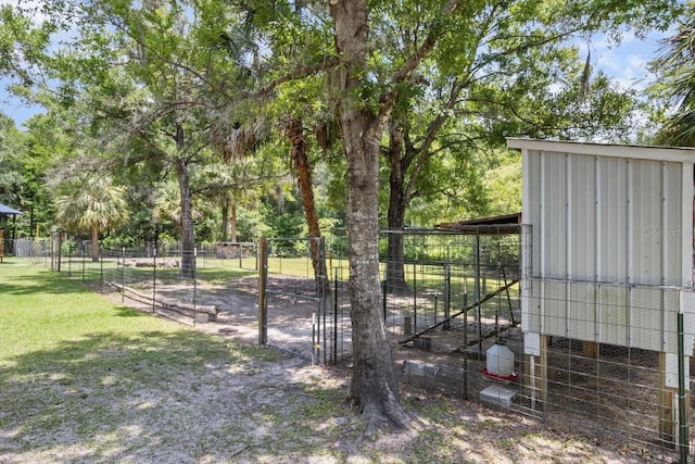 14131 SE 86th Ter, Inglis, FL 34449 - view of yard featuring exterior structure and an outdoor structure