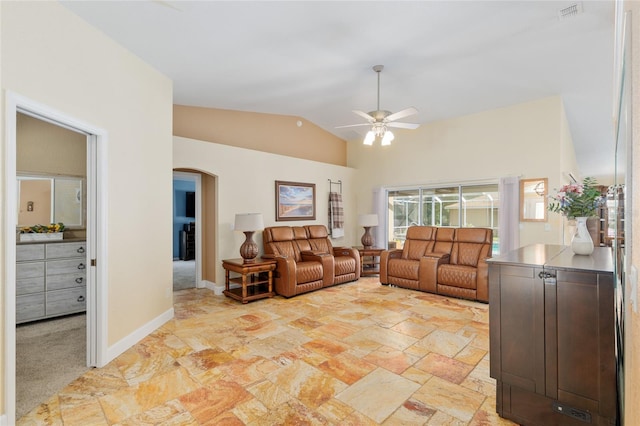 12495 SW 66th St, Ocala, FL 34481 - living room with arched walkways, a ceiling fan, high vaulted ceiling, and baseboards