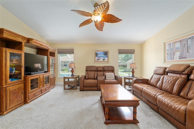 12495 SW 66th St, Ocala, FL 34481 - living area featuring ceiling fan, light carpet, and healthy amount of natural light