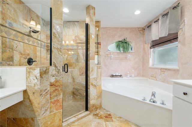 12495 SW 66th St, Ocala, FL 34481 - bathroom with a bath, a shower stall, recessed lighting, and vanity