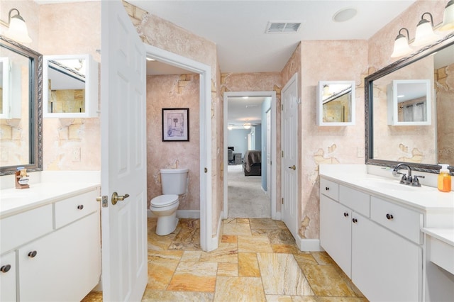 12495 SW 66th St, Ocala, FL 34481 - ensuite bathroom with two vanities and toilet