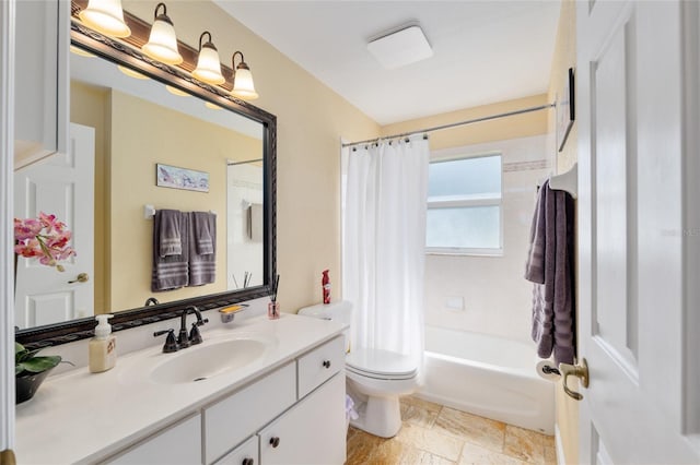 12495 SW 66th St, Ocala, FL 34481 - bathroom featuring vanity, toilet, shower / bath combo with shower curtain, and stone finish floors